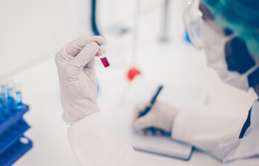 close up. scientists conduct research in the laboratory .