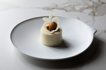 delicious gastronomic restaurant dessert on a table with white tablecloth