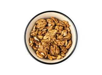 Peeled walnuts in a brown bowl on a white background. The concept of healthy food.