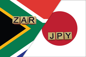 South Africa and Japan currencies codes on national flags background