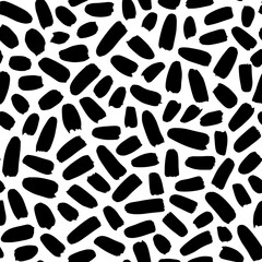 Brush strokes vector seamless pattern. Black paint freehand scribbles, small lines, dry brush stroke texture. Chaotic rough smears. Black and white mosaic texture. Hand drawn grunge ink illustration.