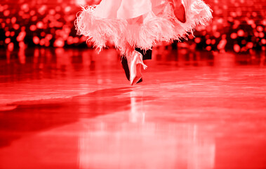 Man and woman dancer latino international dancing.  Ballroom dancing is a team sport. Red color...