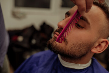 Hipster client visiting barber shop
