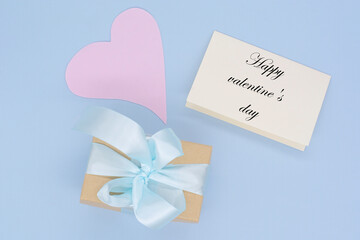 gift craft box on a blue background. Valentine's Day.