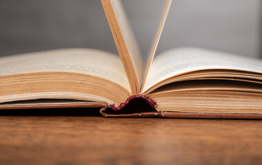 open book on wooden table