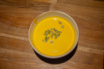 Creamy pumpkin soup with the pumpkin seed on top, served in Saint Petersburg, Russia