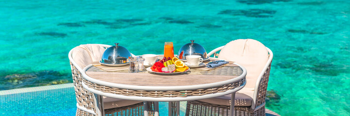 Vacation breakfast table at luxury restaurant or hotel room panoramic banner. Romantic cruise...