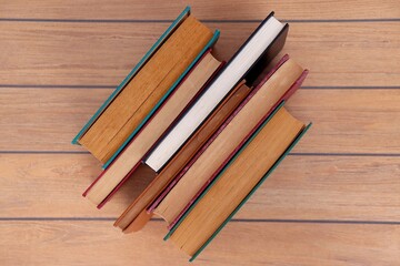 Books on wooden background. 