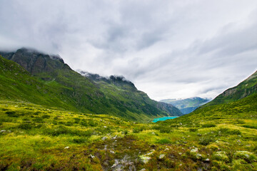 landscape with clouds and Vermuntstausee (Silvretta - Vorarlberg/Tyrol, Austria)