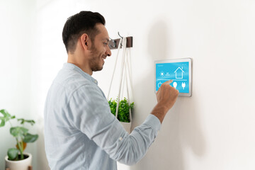 Latin man enjoying his smart home