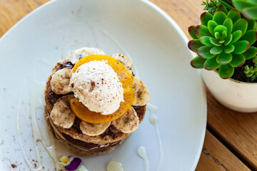 American pancace with banana and chocolate