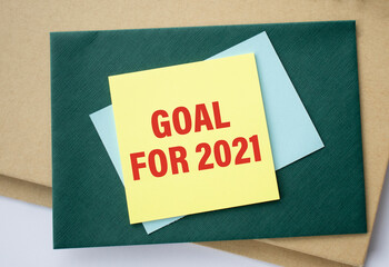 planner of goals and plans for 2021, a sheet of paper with the inscription buy a house from to do list, planning concept