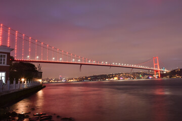 Fototapeta na wymiar Bosphorus bridge (15 Temmuz Sehitler Koprusu) at night scene, Istanbul, Turkey