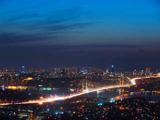 Fototapeta premium 15 July Martyrs Bridge (15 Temmuz Sehitler Koprusu) at night scene, Istanbul, Turkey. Panoramic view of Istanbul and Bosphorus bridge from Camlica Hill. 