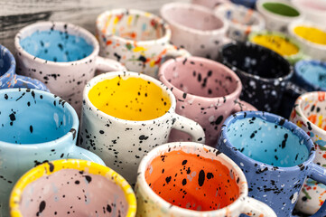 Colorful craft ceramic or pottery mugs