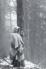woman in the snowy forest