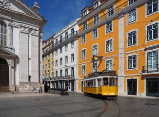 Fototapeta na wymiar Colorful houses build the cityscape of Lisbon in Portugal with a traml