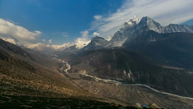 Timelapse from Dingboche village. View of impressive Ama Dablam peak and other mountains of the Himalaya range. Picturesque valley. Nepal