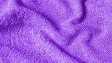 Fototapeta na wymiar purple cotton fabric with visible details. background