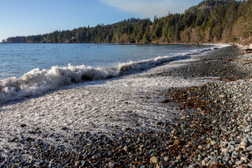 Waves crashing on the rocky coast of French Beach Provincial Park, Shirley, BC
