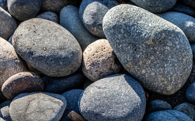 Close up of smooth rocks on the the beach at French Beach Provincial Park, Canada