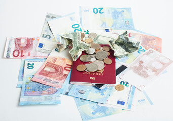 Cash on table isolated: dollars, euro, rubl broken money. All in mess, global crisis . passport travel concept