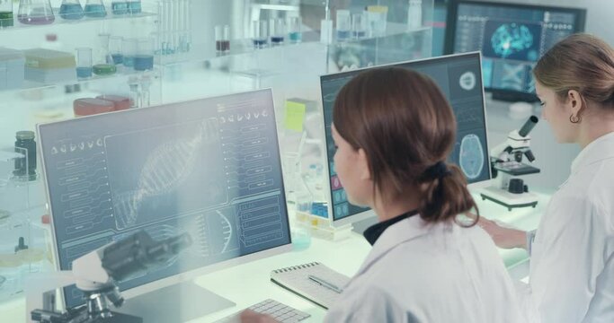 Female scientists studying brainwave scanning models and DNA sequences