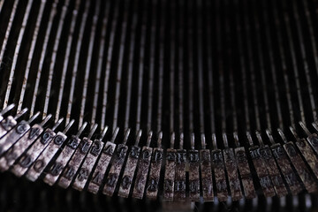 old typewriter on table, words fake news are printed on paper in large size, retro style, concept to do list to organize work and life
