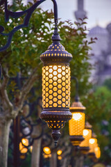 Decorative lanterns in Ramazan month on Sultanahmet square, Istanbul, Turkey at night.