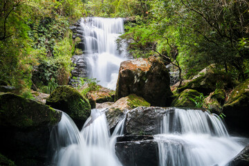 Beautiful waterfall with forest in Aiuruoca/MG, Brazil