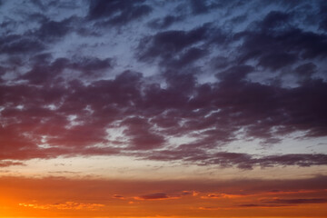 Fototapeta na wymiar Sky sunset in the evening with colorful orange sunlight. Beautiful majestic nature background