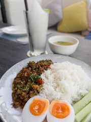 Thaifood basil chicken with boiled egg