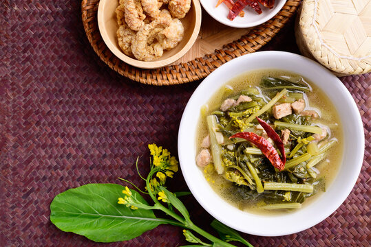 Northern Thai food (Pak Kad Jor), Sour soup Thai flowering bok choy with pork eating with dry chili, pork rind and sticky rice