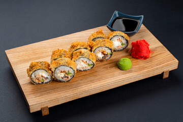 Nourishing japanese lunch: warm sushi with fresh,philadelphia cheese and caviar