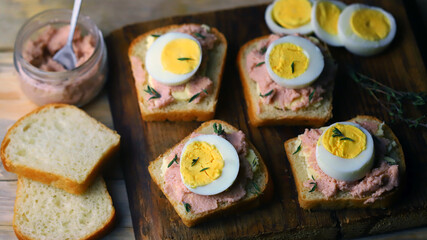 Sandwiches with cod caviar, butter and egg. Healthy high-calorie breakfast. The keto diet.