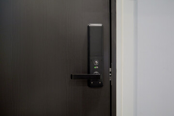 Digital door lock security systems for access protection of hotel, apartment door. Electronic door handle with key pads numbers. Selective focus