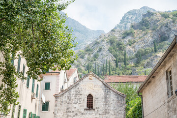 Fototapeta na wymiar Kotor Old Town Lapidarium with a backdrop of the stunning surrounding mountains,Kotor ,Montenegro.