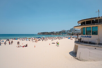 Busy Bondi Beach on a sunny day.