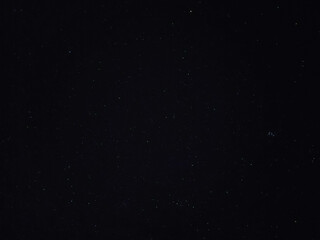 Stars in the open sky at night.
