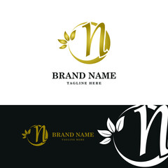 Golden Luxury Initial letter n on circle leaves for cosmetic, restaurant, boutique, hotel logo concept vector