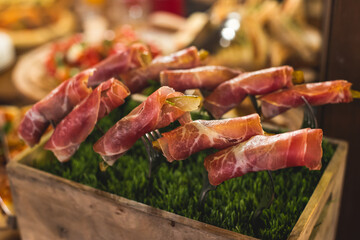 Beautifully decorated catering banquet table with different food snacks and appetizers on corporate christmas birthday party event or wedding celebration