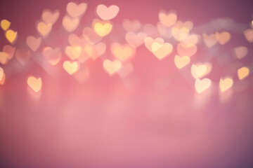 Blurred hearts lights. Valentines day pink Bokeh background