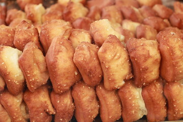 Bolang-baling is fried bread made from wheat flour with good taste, generally sold on the side of the road.