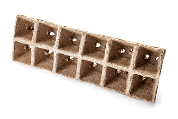 Peat pots for gardening on white background