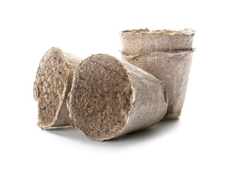 Peat pots for gardening on white background