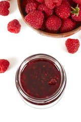 fresh raspberries jam isolated on white background