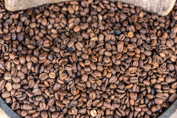 Top view of Dark roast coffee beans background