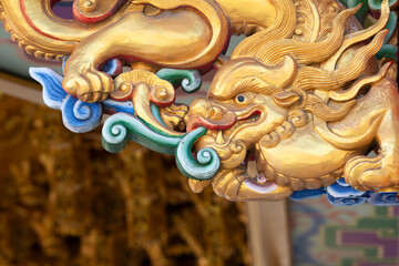 Fototapeta premium Dragon statue at the ancient Chinese temple in Thailand