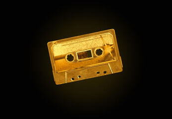 Gold tape recorder on a black background. 3D illustration.