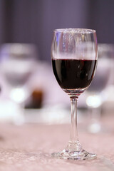 Glasses of red wines on table for evening party